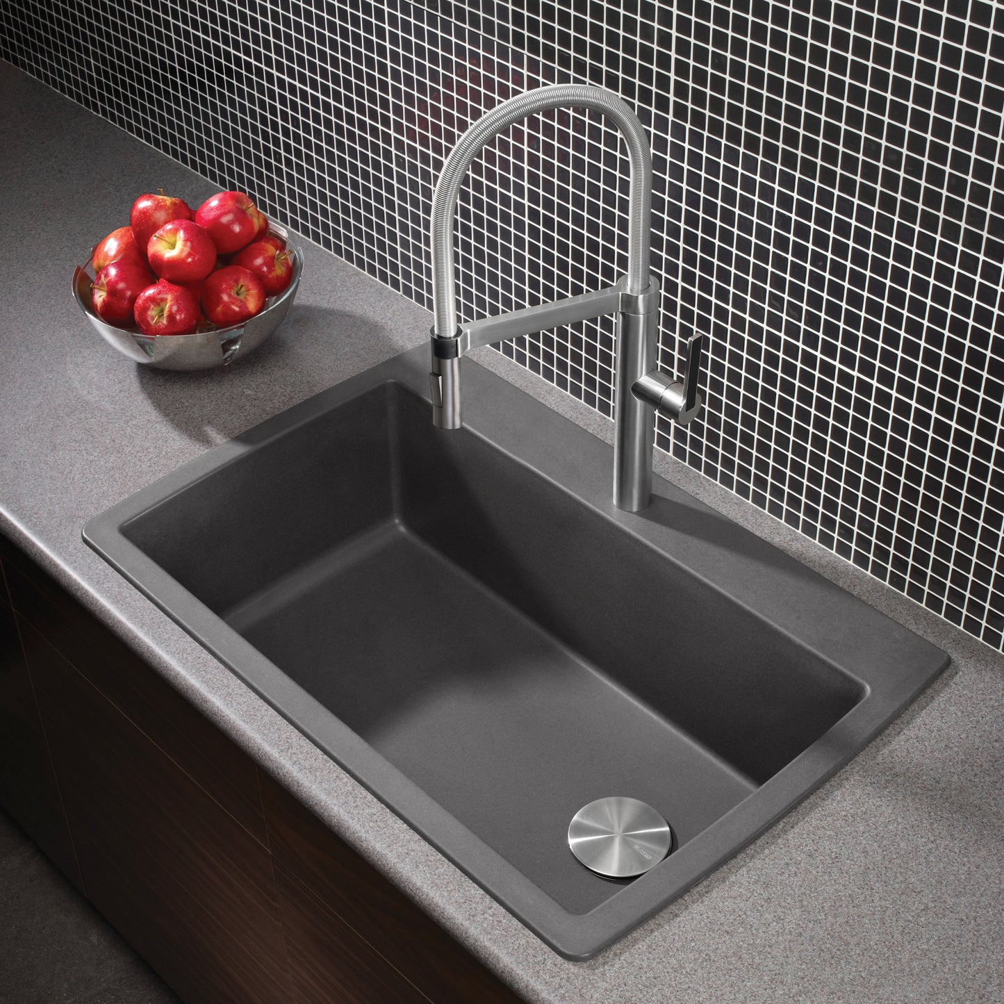 BLANCO Diamond SILGRANIT 33.5" Super Single Dual Mount Kitchen Sink with modern faucet and bowl of apples.
