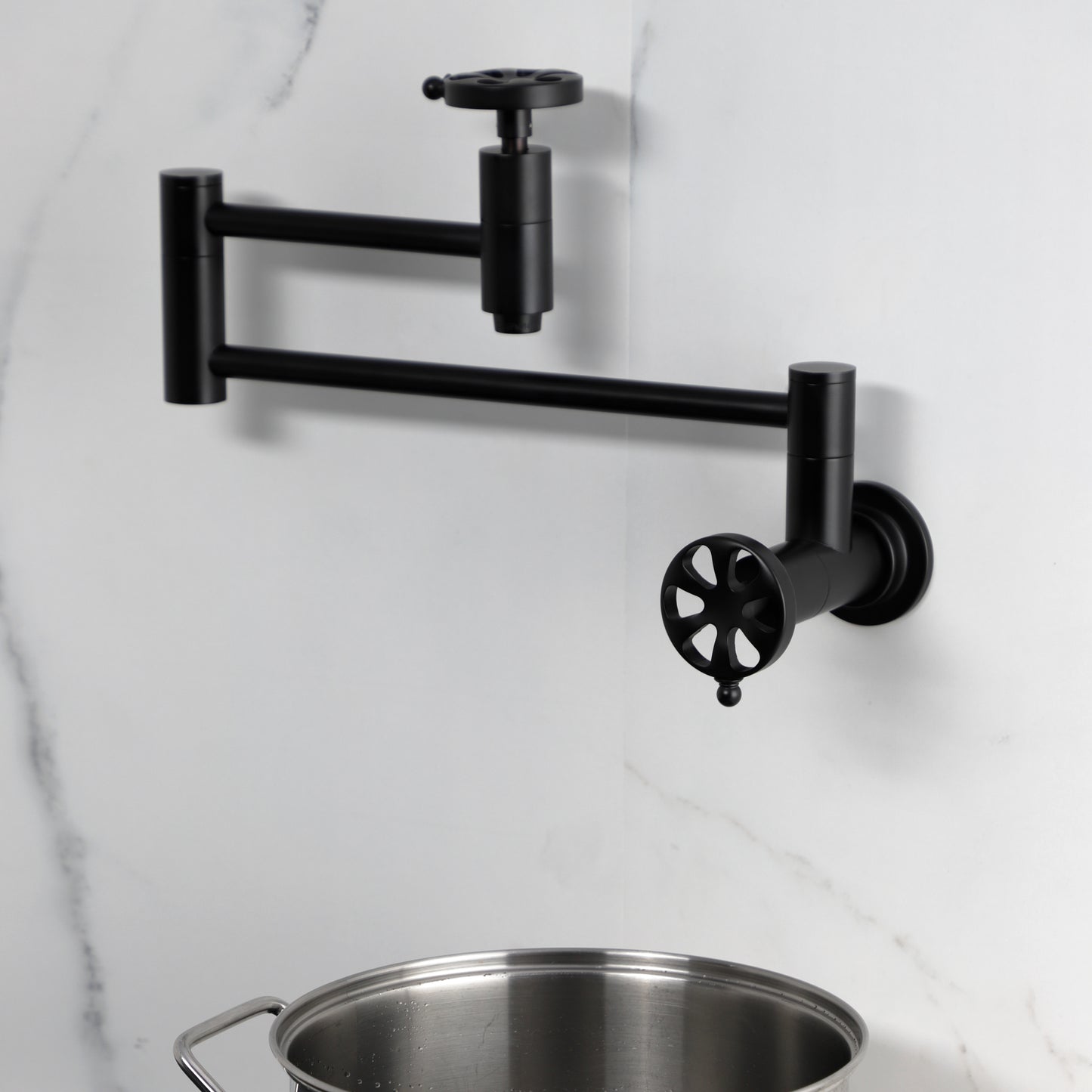 Kingston Brass KS8103RX Belknap Wall Mount Pot Filler Faucet, Antique Brass in modern kitchen setting