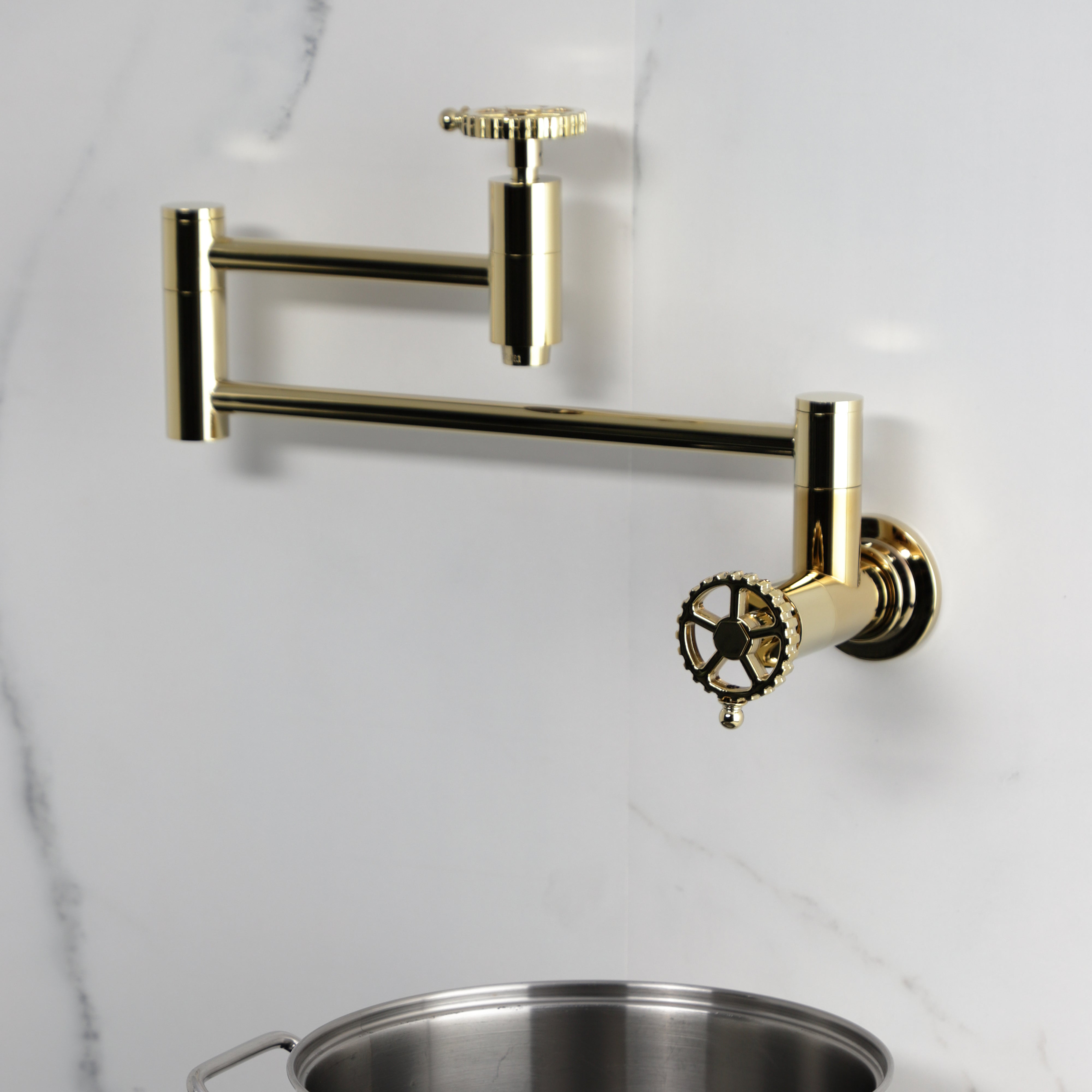 Kingston Brass KS8103CG Fuller Wall Mount Pot Filler Faucet, Antique Brass on a white background