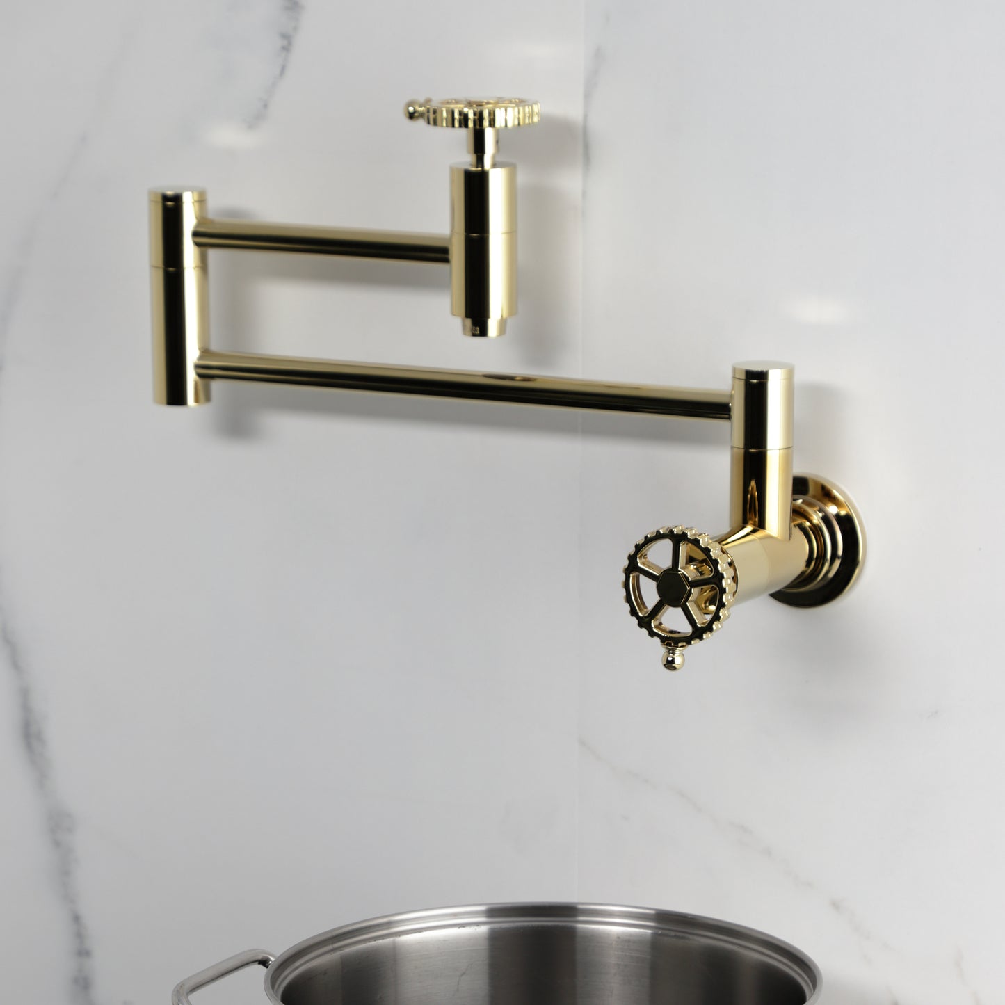 Kingston Brass KS8103CG Fuller Wall Mount Pot Filler Faucet, Antique Brass on a white background