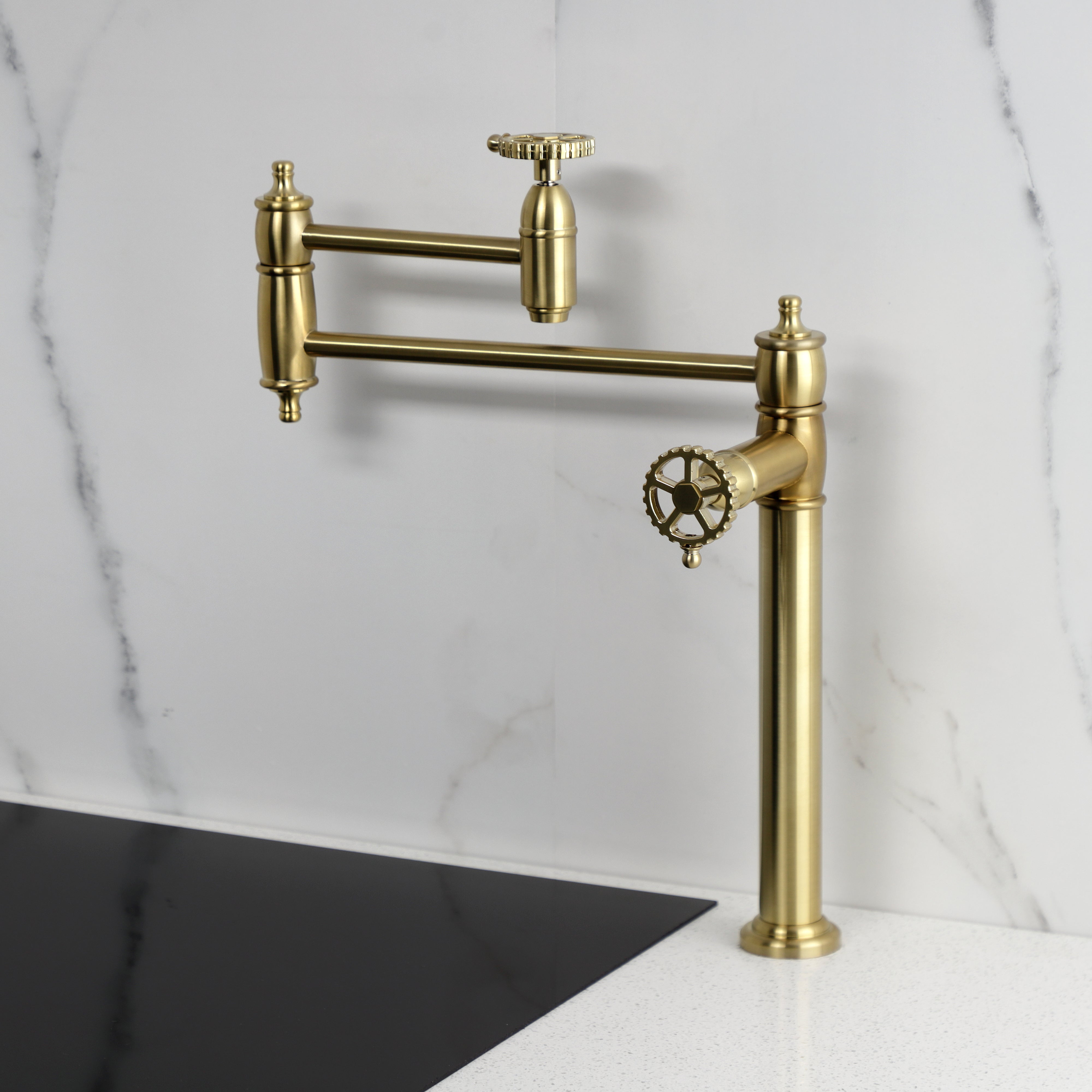 Kingston Brass KS3703CG Fuller Deck Mount Pot Filler Faucet, Antique Brass on countertop.