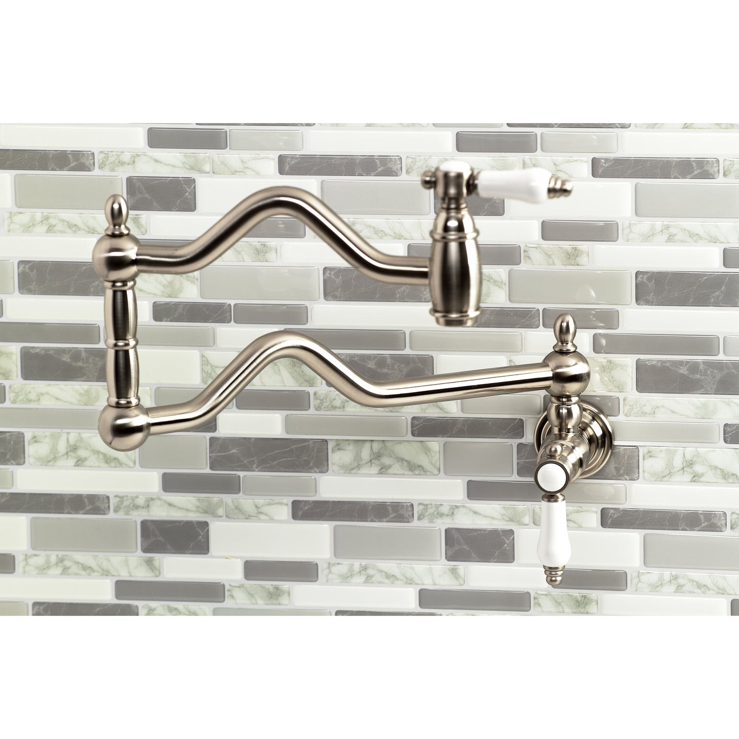 Kingston Brass KS2107BPL Bel-Air Wall Mount Pot Filler Faucet, Brushed Brass with white porcelain levers and foldable swing arms.