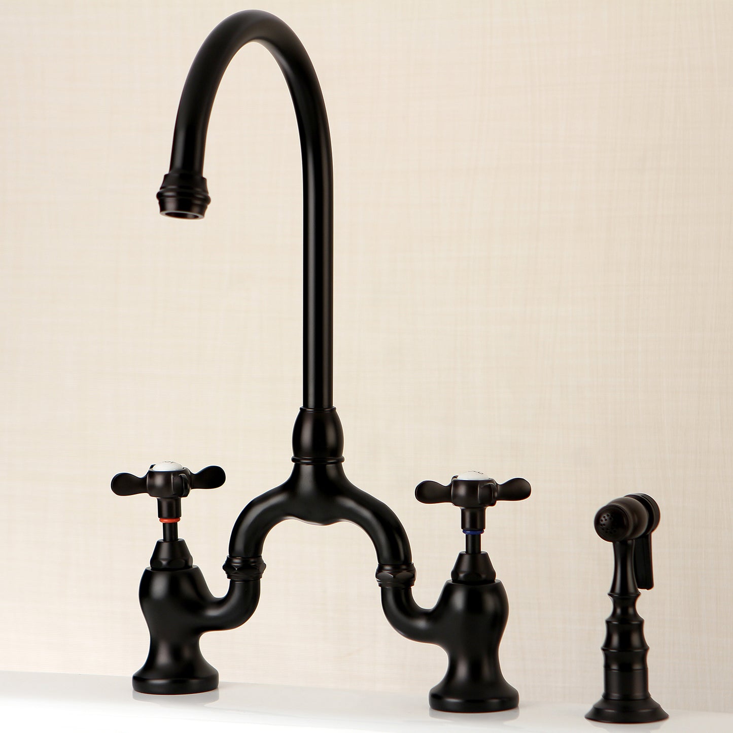Kingston KS7798BEXBS Essex Bridge Kitchen Faucet with Brass Sprayer, Brushed Nickel in black finish.
