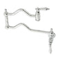 Kingston Brass KS2107AL Heritage Wall Mount Pot Filler Faucet, Brushed Brass with polished chrome finish.
