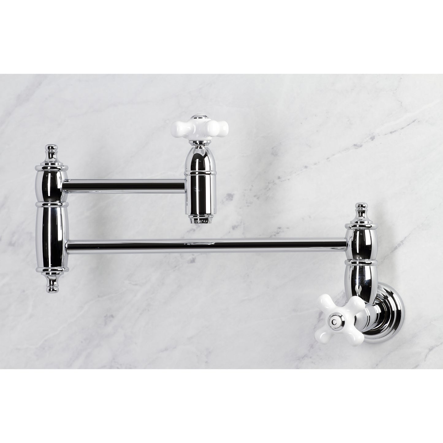 Kingston Brass KS310PXAC Restoration Wall Mount Pot Filler Faucet, Antique Copper on marble background