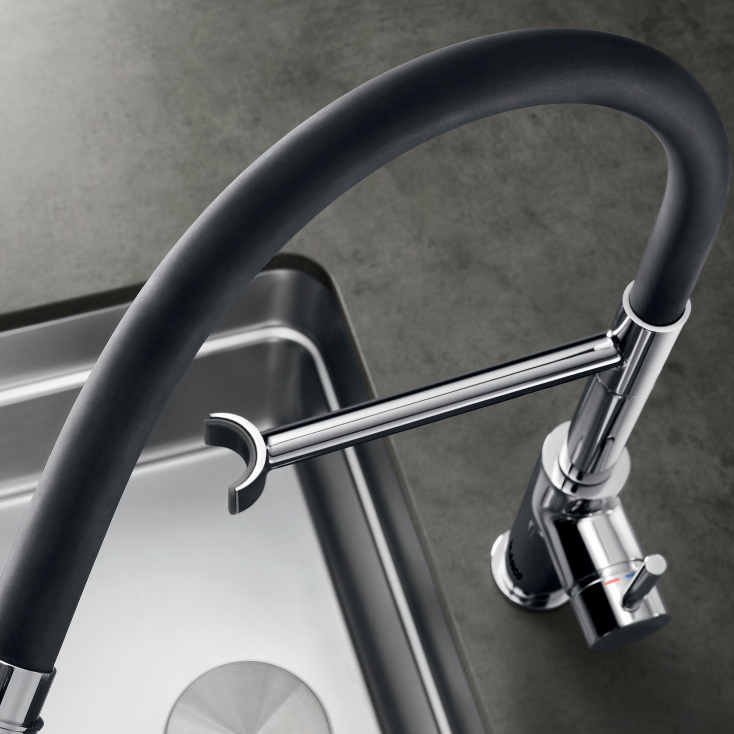 BLANCO Catris Flexo Semi-Pro Pull-Down Dual-Spray Kitchen Faucet with flexible black hose and chrome body.