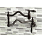 Kingston Brass KS2107AL Heritage Wall Mount Pot Filler Faucet, Brushed Brass on a stylish kitchen backsplash.