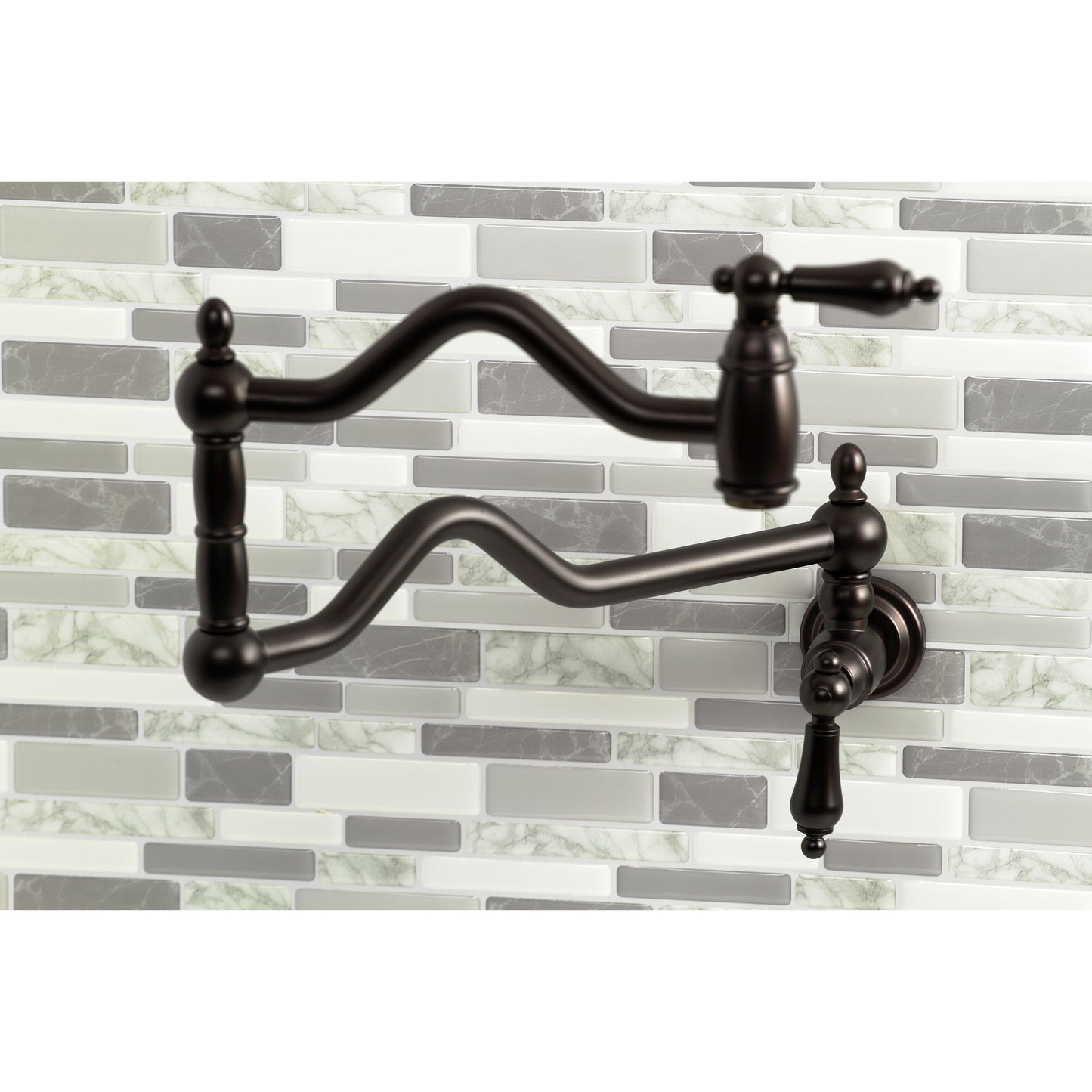 Kingston Brass KS2107AL Heritage Wall Mount Pot Filler Faucet, Brushed Brass on a stylish kitchen backsplash.