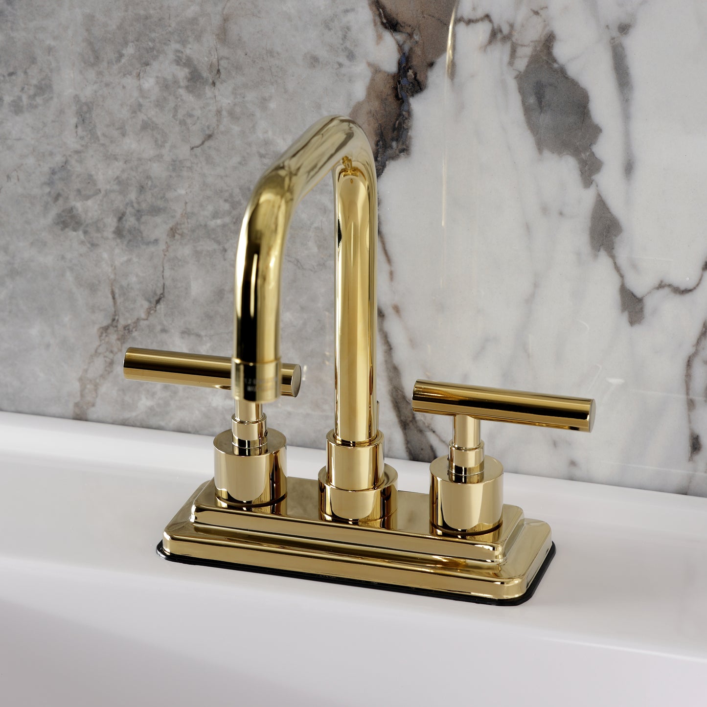 Close-up view of Kingston Brass KS6643CML Manhattan Centerset Bathroom Faucet showcasing high-arc design and lever handles.
