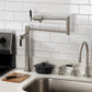 Kingston Brass KS4703CKL Kaiser Deck Mount Pot Filler Faucet, Antique Brass on countertop with modern sink.