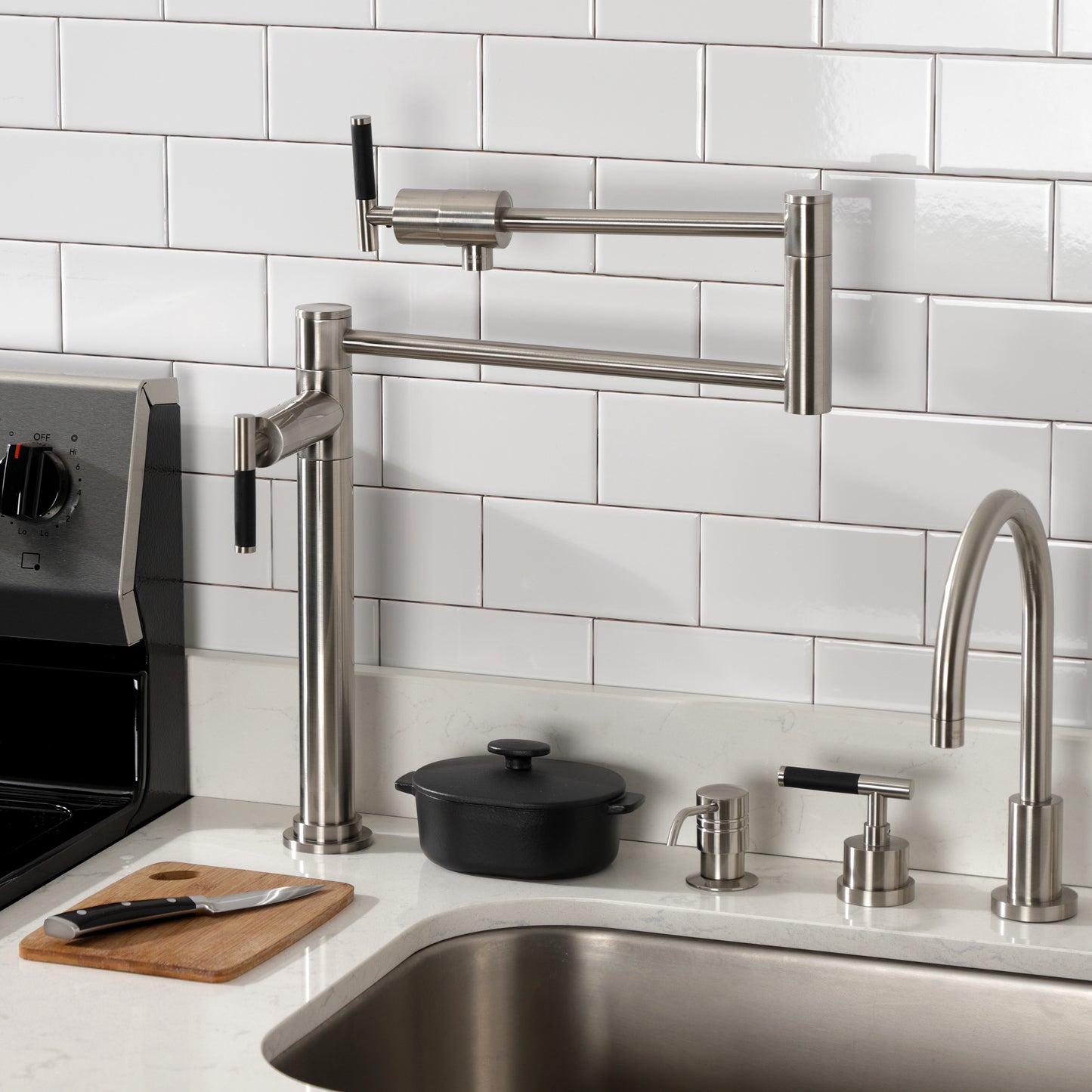 Kingston Brass KS4703CKL Kaiser Deck Mount Pot Filler Faucet, Antique Brass on countertop with modern sink.