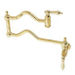 Kingston Brass KS2107AL Heritage Wall Mount Pot Filler Faucet, Brushed Brass showcasing elegant design and foldable swing arms.