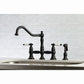 Kingston KS3277PLBS Restoration Bridge Kitchen Faucet with Brass Sprayer, Brushed Brass in a classic kitchen setting.