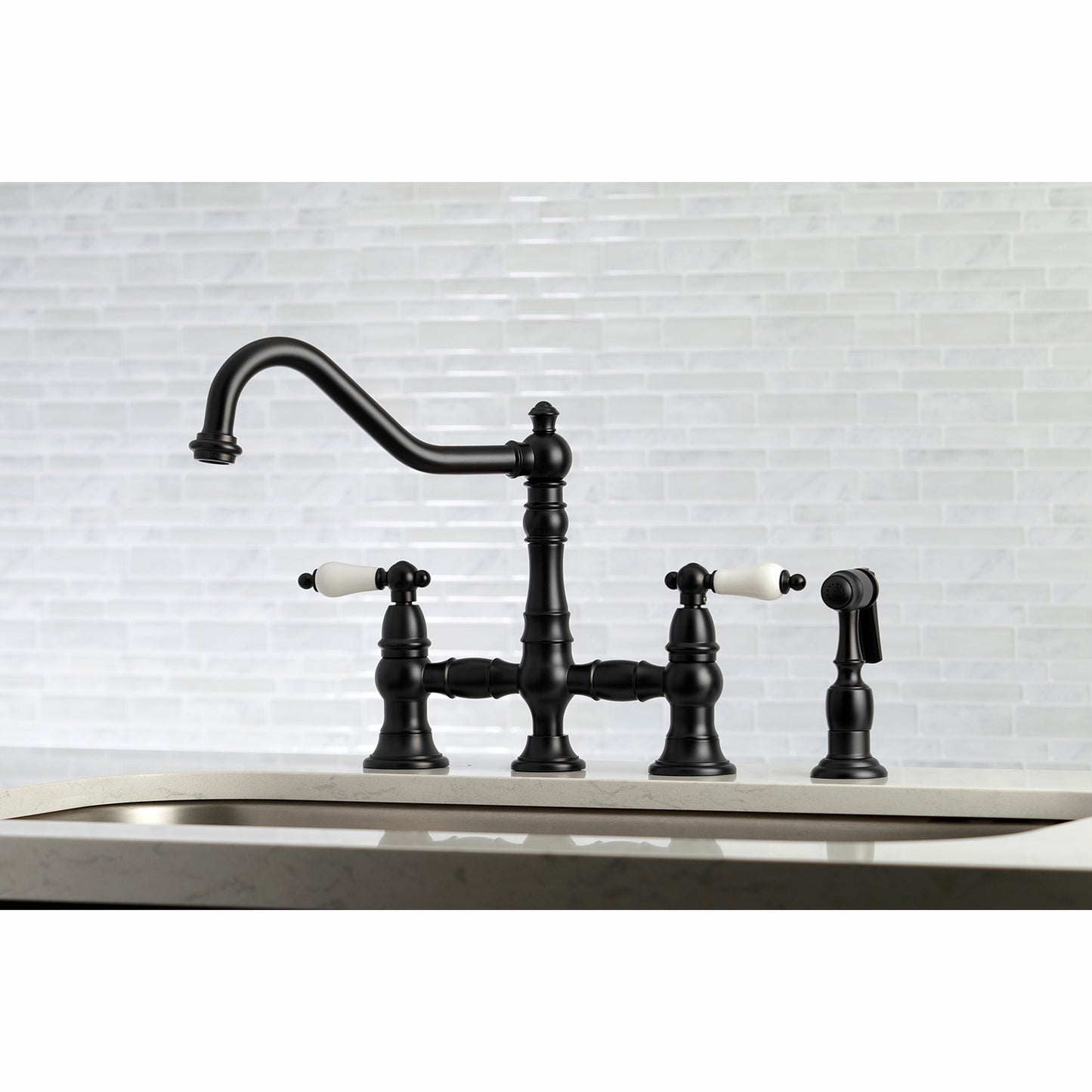 Kingston KS3277PLBS Restoration Bridge Kitchen Faucet with Brass Sprayer, Brushed Brass in a classic kitchen setting.
