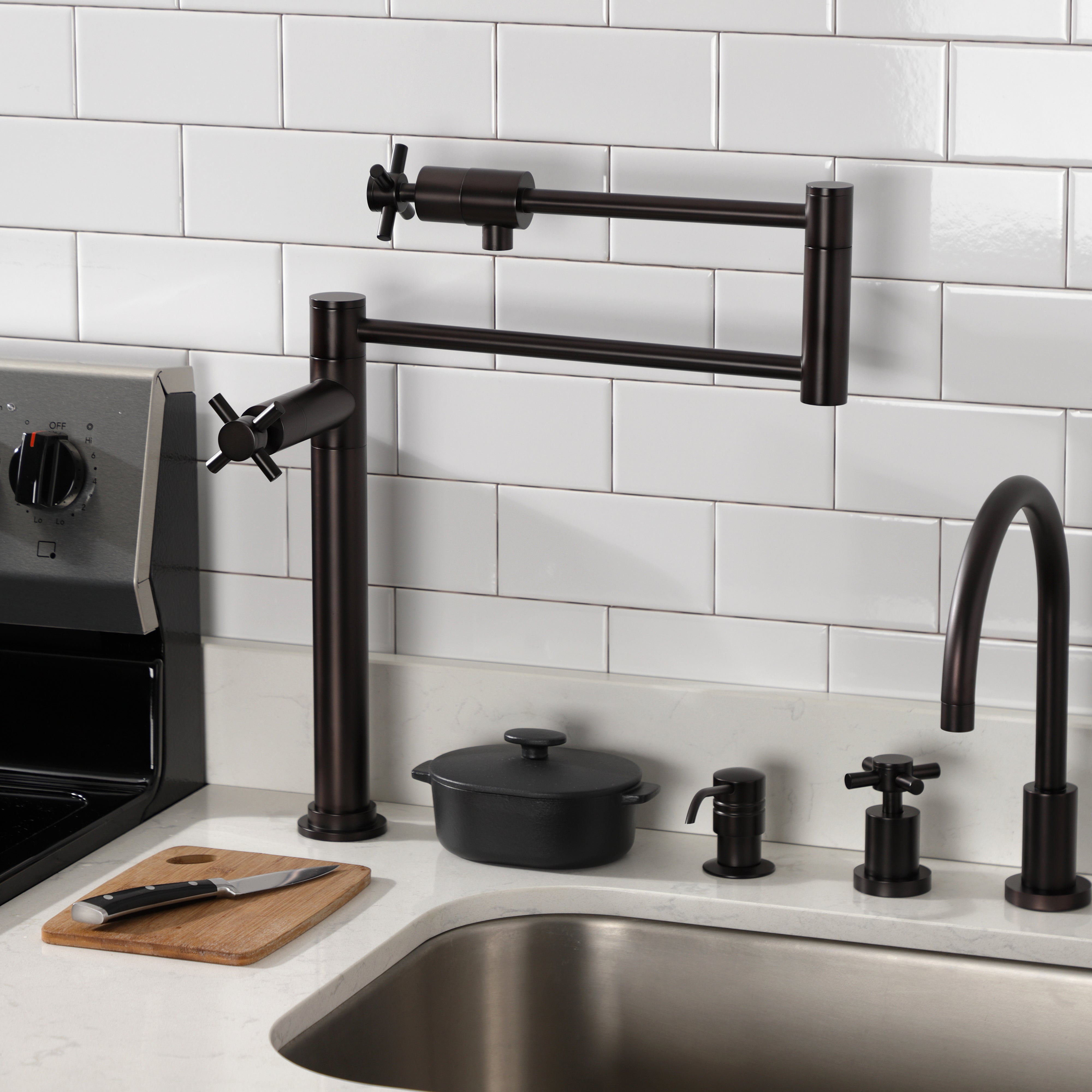 Kingston Brass KS4703DX Concord Deck Mount Pot Filler Faucet, Antique Brass on countertop with kitchen appliances.