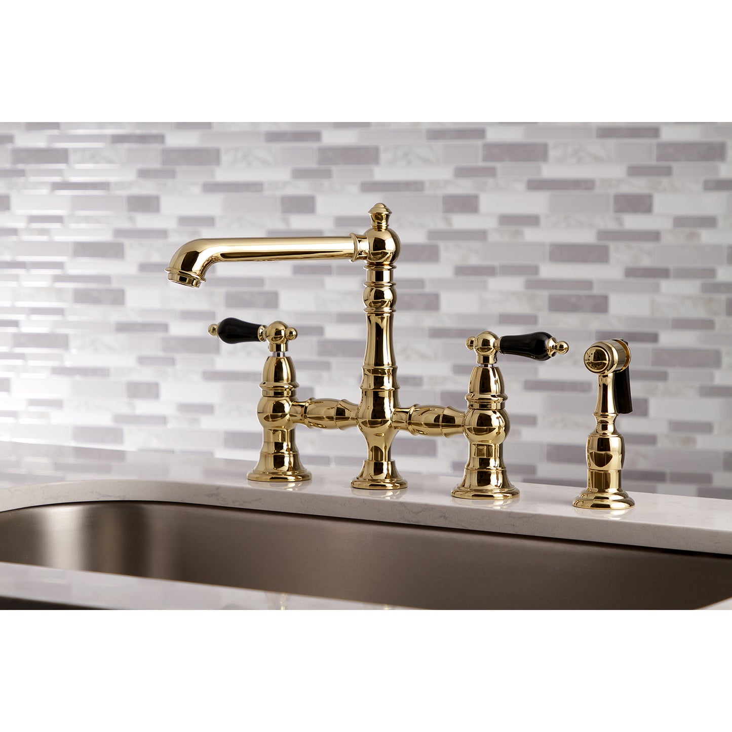 Kingston KS7277PKLBS Duchess Bridge Kitchen Faucet with Brass Sprayer, Brushed Brass on kitchen counter