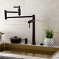 Kingston Brass KS870DLAC Concord Deck Mount Pot Filler Faucet, Antique Copper design in a modern kitchen setting