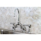 Kingston KS7793ALBS English Country Bridge Kitchen Faucet with Brass Sprayer, Antique Brass in a stylish kitchen setting.