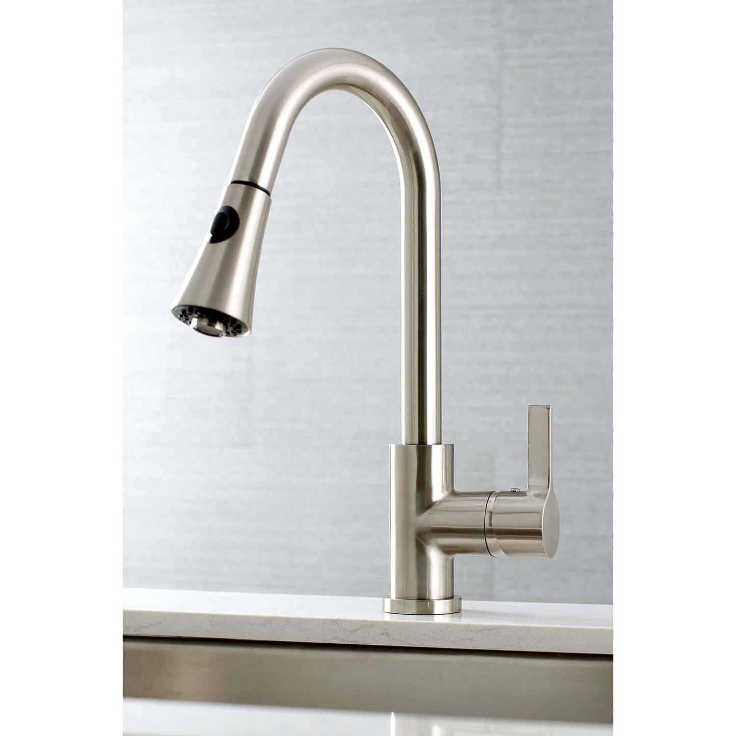 Right side view of Kingston Brass LS8723CTL Continental Pull-Down Kitchen Faucet showcasing curved spout design.