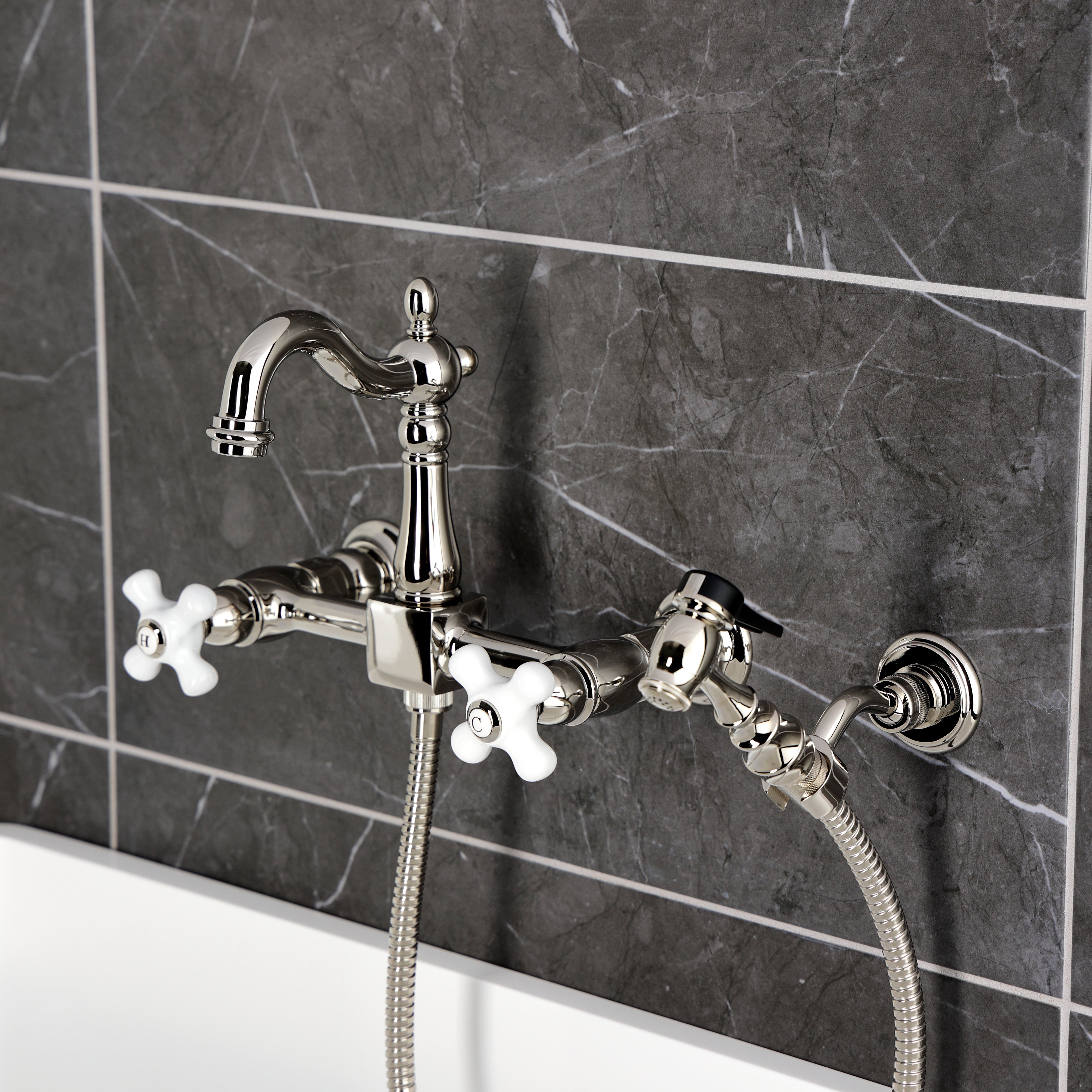 Kingston KS2443PXBS Heritage Two-Handle Wall Mount Bridge Kitchen Faucet with Brass Sprayer, Antique Brass