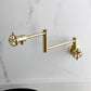 Kingston Brass KS4103RX Belknap Wall Mount Pot Filler Faucet, Antique Brass on a modern kitchen backsplash.