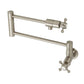 Kingston Brass KS4103BX Metropolitan Wall Mount Pot Filler Faucet, Antique Brass with foldable swing arms.