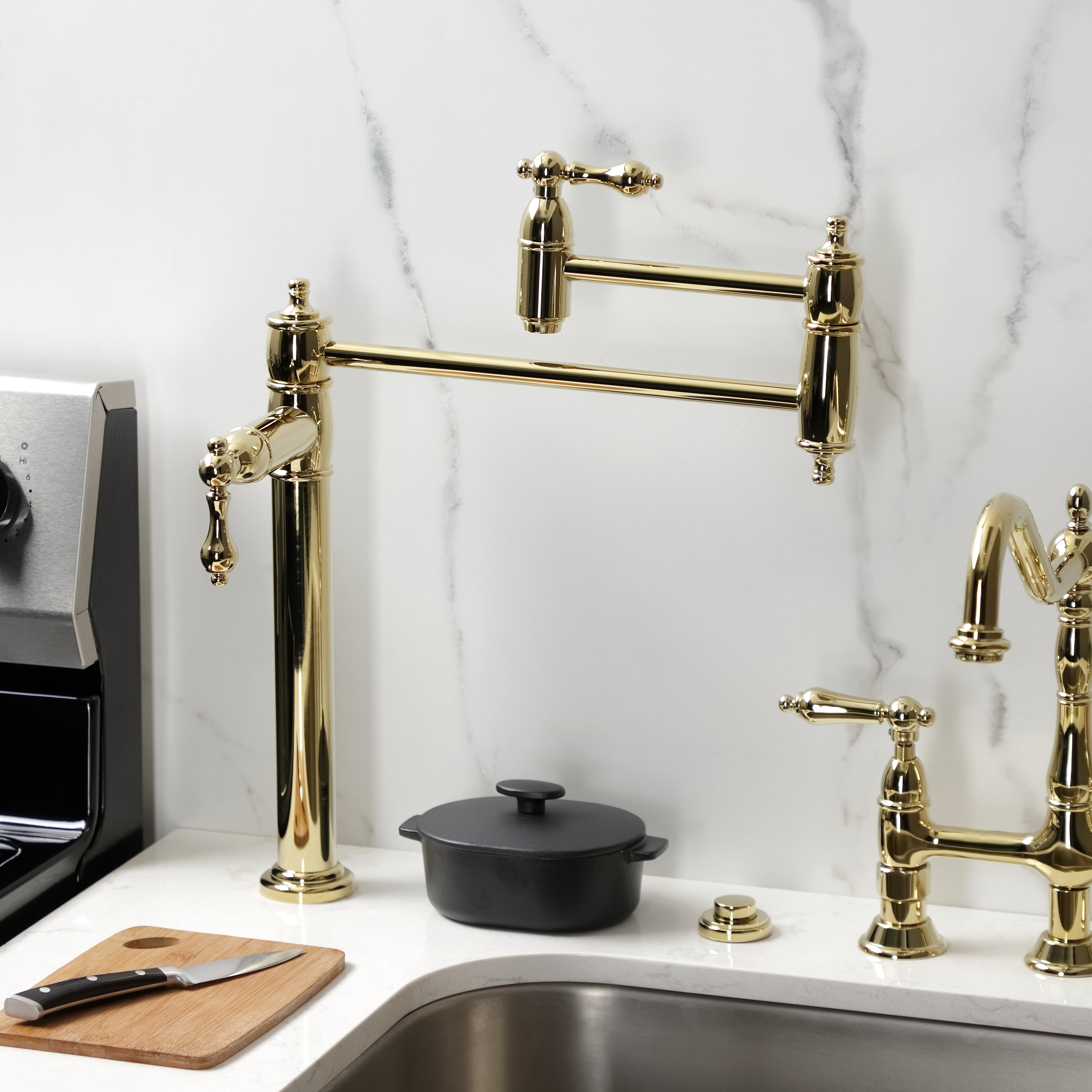 Kingston Brass KS3703AL Restoration Deck Mount Pot Filler Faucet, Antique Brass in kitchen setting with stove and cutlery.