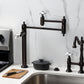 Kingston Brass KS370PXAC Restoration Deck Mount Pot Filler Faucet, Antique Copper in kitchen with stove and sink