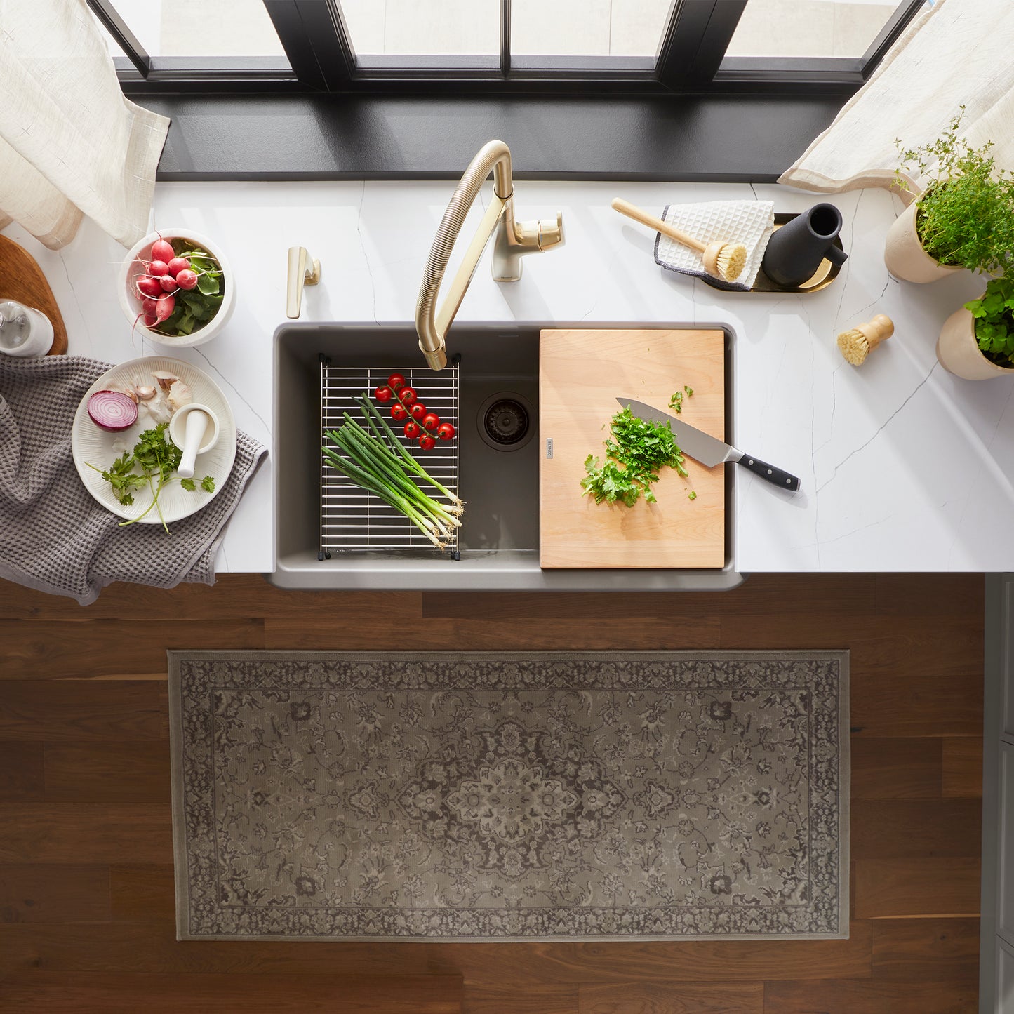 BLANCO Ikon SILGRANIT 30" Single Bowl Apron-Front Farmhouse Sink with fresh vegetables and chopping board.