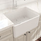 BOCCHI Classico 24" Fireclay Farmhouse Apron Single Bowl Kitchen Sink installed in a modern kitchen.