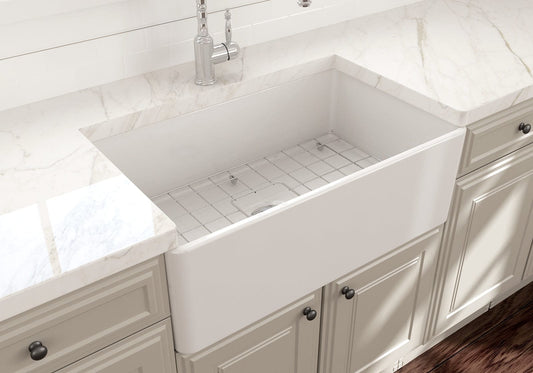 Top view of BOCCHI CLASSICO 30" Fireclay Farmhouse Single Bowl Kitchen Sink with Protective Bottom Grid and Strainer in white.