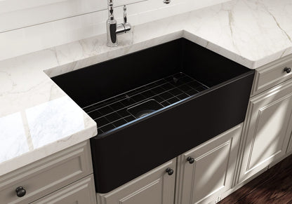 Top view of BOCCHI CLASSICO 30" Fireclay Farmhouse Single Bowl Kitchen Sink with Protective Bottom Grid and Strainer in Matte Black.