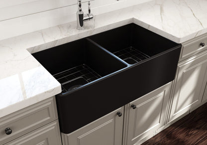 BOCCHI Classico 33" Fireclay Farmhouse Apron 50/50 Double Bowl Kitchen Sink in a modern kitchen setting.