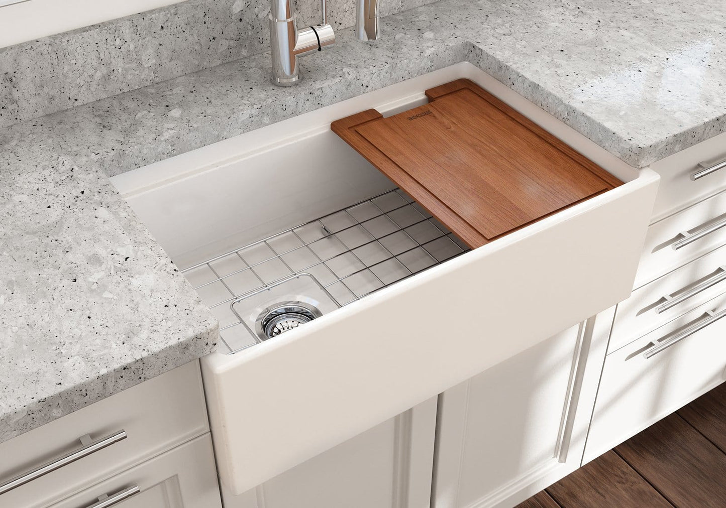 Lifestyle image of white BOCCHI Contempo 30 inch sink in a modern kitchen with cutting board in use