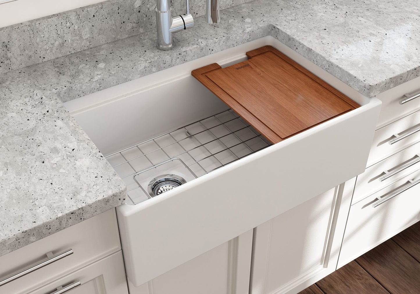 Lifestyle image of a matte white BOCCHI Contempo 30" sink in a modern kitchen with cutting board in use