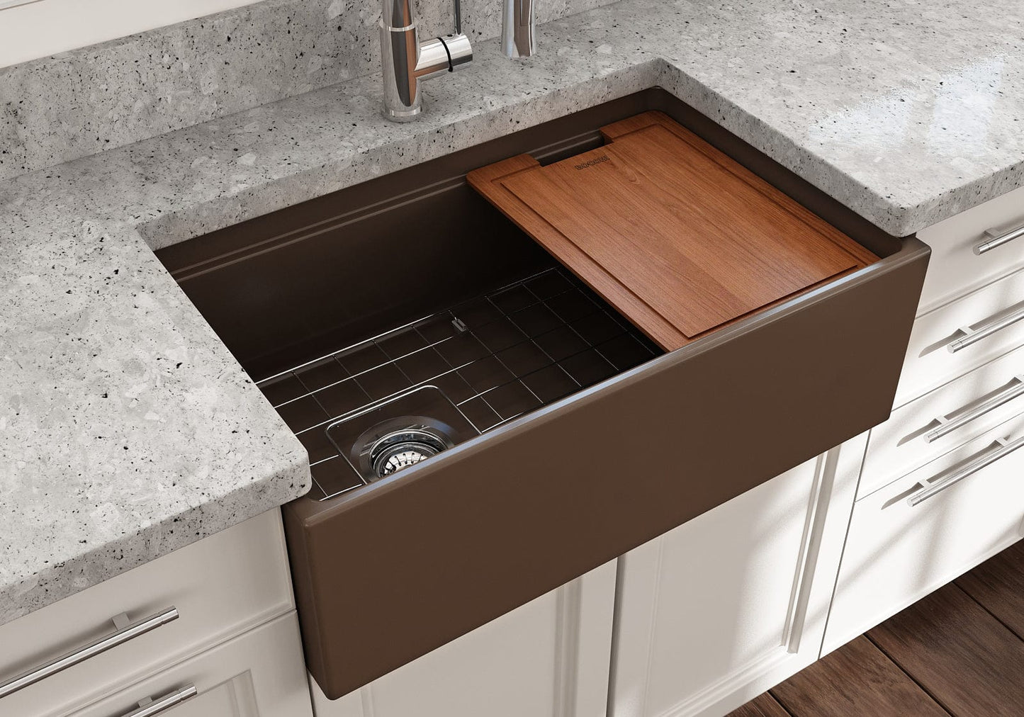 Lifestyle image of a matte brown BOCCHI Contempo 30" sink in a modern kitchen with cutting board in use