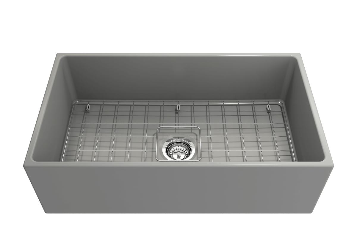 Front angle view of Bocchi Contempo 33" Fireclay Farmhouse Sink in Matte Gray showing included strainer and bottom grid.