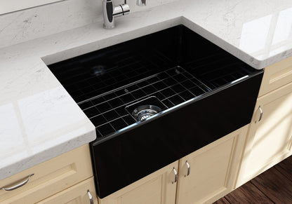 BOCCHI CONTEMPO 27" Fireclay Farmhouse Single Bowl Kitchen Sink with Protective Bottom Grid and Strainer in black, top view with counter