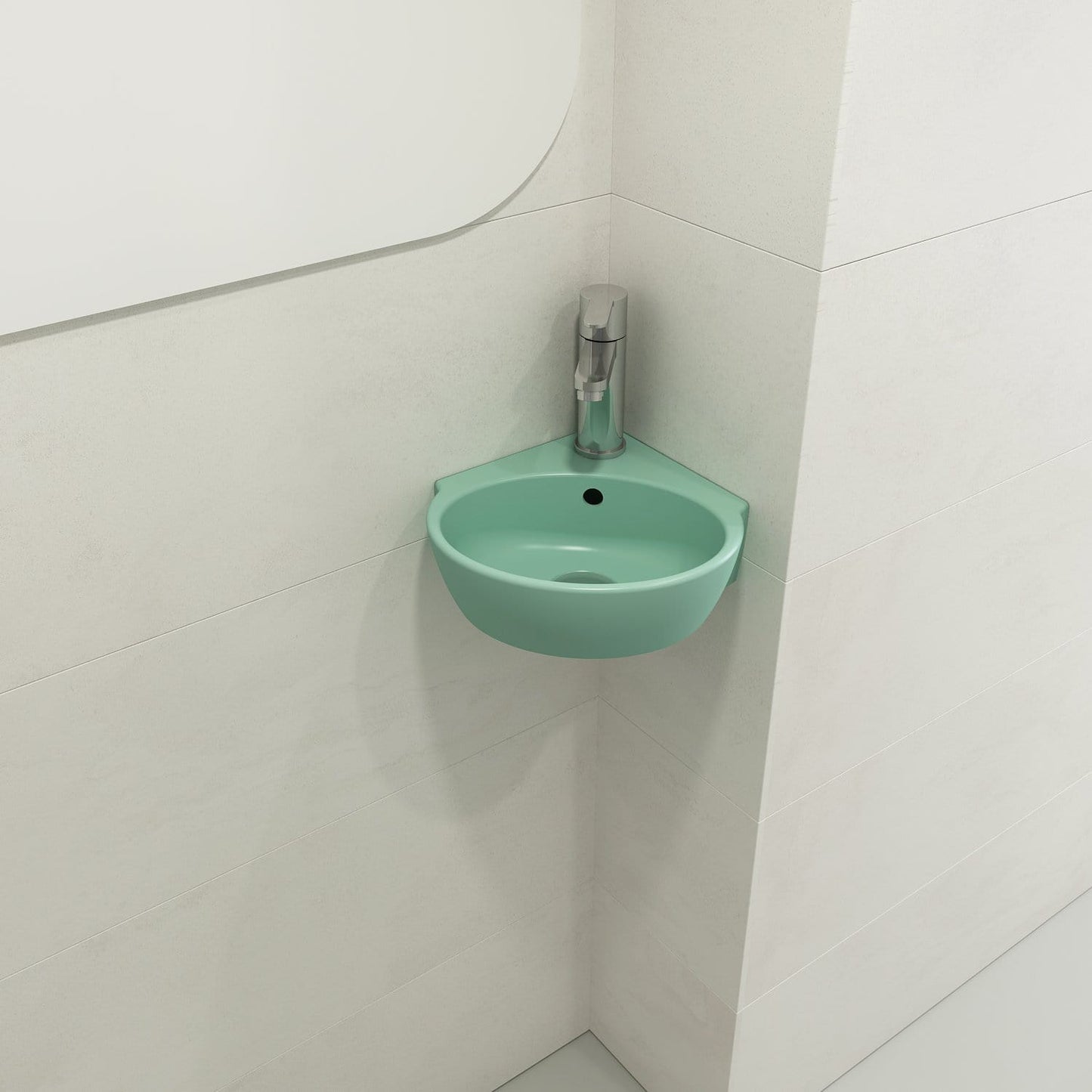 BOCCHI MILANO 12" Corner Sink Fireclay 1-Hole With Overflow in Matte Mint Green, elegantly mounted in a compact bathroom space.