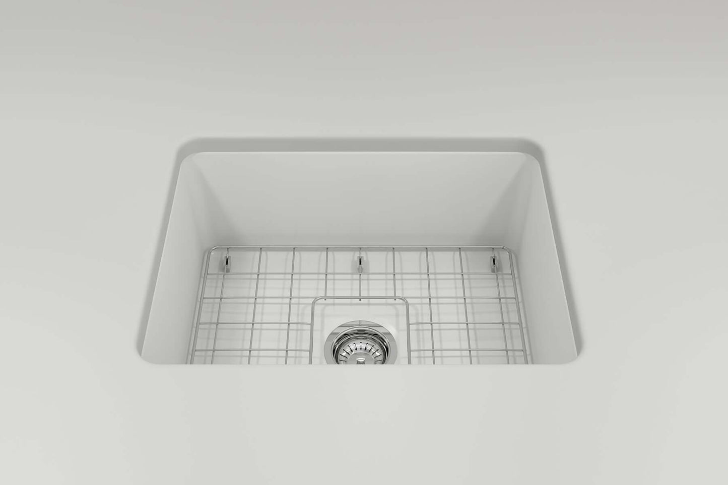 Inside view of BOCCHI SOTTO 24" Fireclay Dual-Mount Single Bowl Sink with Bottom Grid & Strainer.