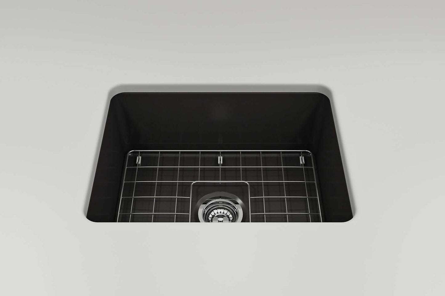 BOCCHI SOTTO 24" Fireclay Dual-Mount Single Bowl Sink with Bottom Grid & Strainer showcasing the sleek black interior.