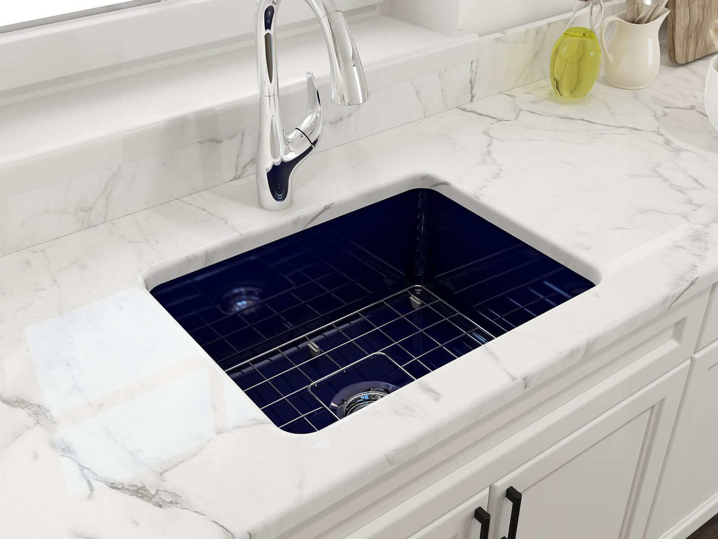 BOCCHI SOTTO 24" Fireclay Dual-Mount Single Bowl Sink with Bottom Grid & Strainer in Sapphire Blue on marble countertop.