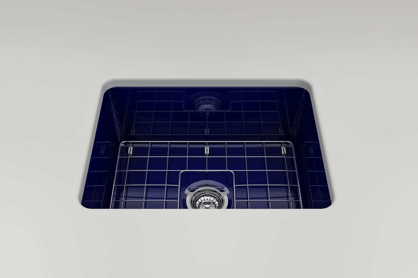 BOCCHI SOTTO 24" Fireclay Dual-Mount Single Bowl Sink with Bottom Grid & Strainer in deep blue finish, showcasing grid and drain.