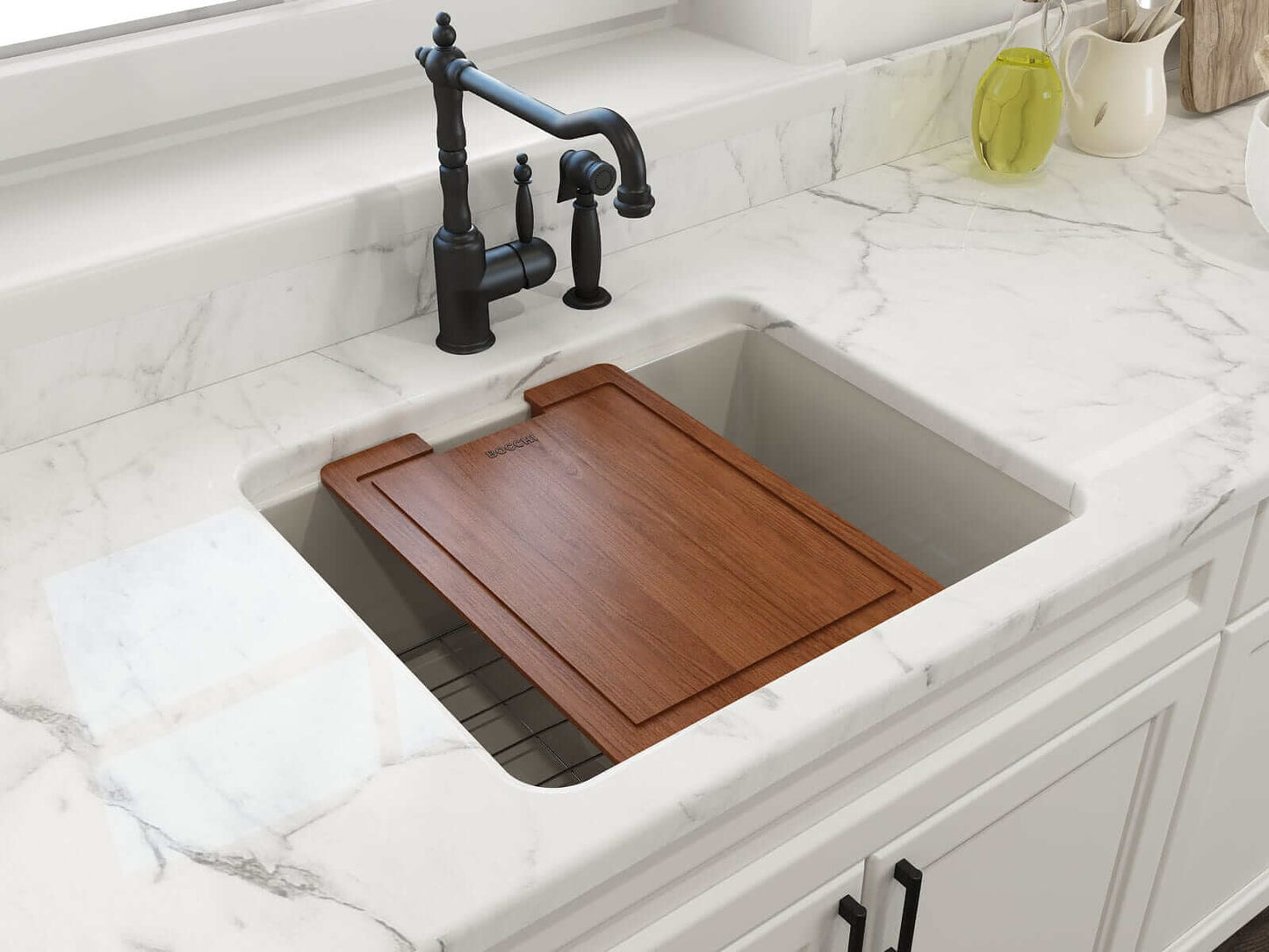 BOCCHI SOTTO 24" Fireclay Dual-Mount Single Bowl Sink with Bottom Grid & Strainer featuring a wooden cutting board on a marble countertop.