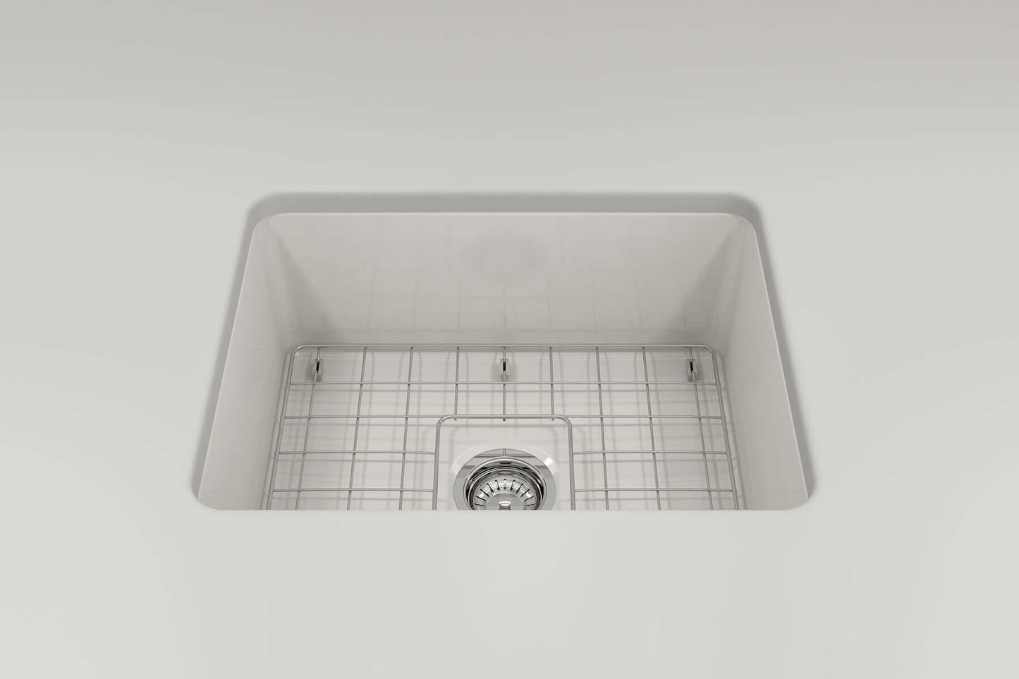 BOCCHI SOTTO 24" Fireclay Dual-Mount Single Bowl Sink with Bottom Grid & Strainer, top view showing sink with grid.