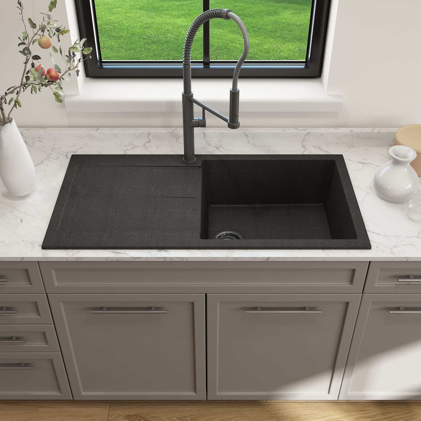 BOCCHI LEVANZO 20" Granite Kitchen Sink with Drain Board installed in a modern kitchen with a marble countertop.
