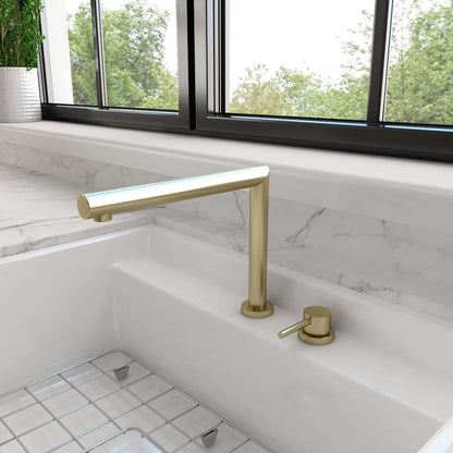 BOCCHI BAVENO Move Kitchen Faucet with telescopic design and elegant brass finish in modern kitchen setting.