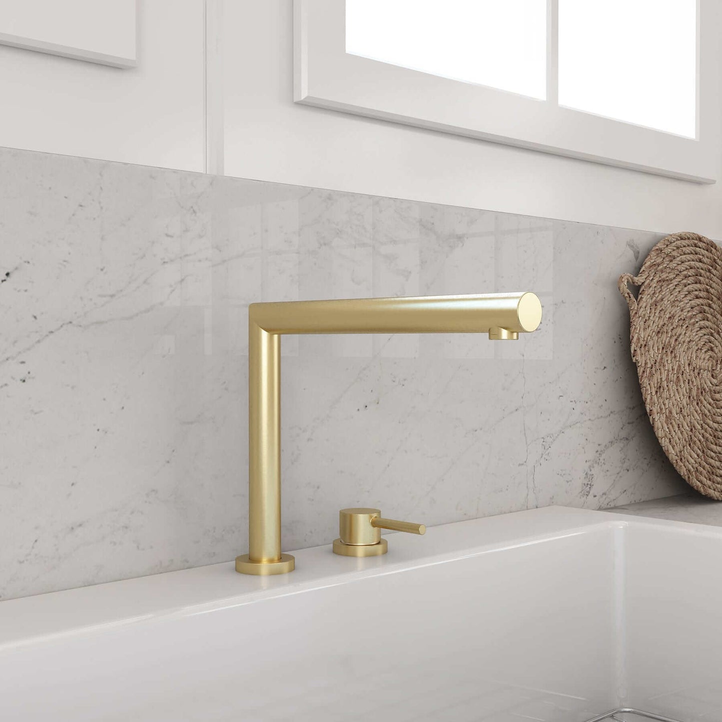 BOCCHI BAVENO Move Kitchen Faucet in gold finish with modern design against a marble backsplash.
