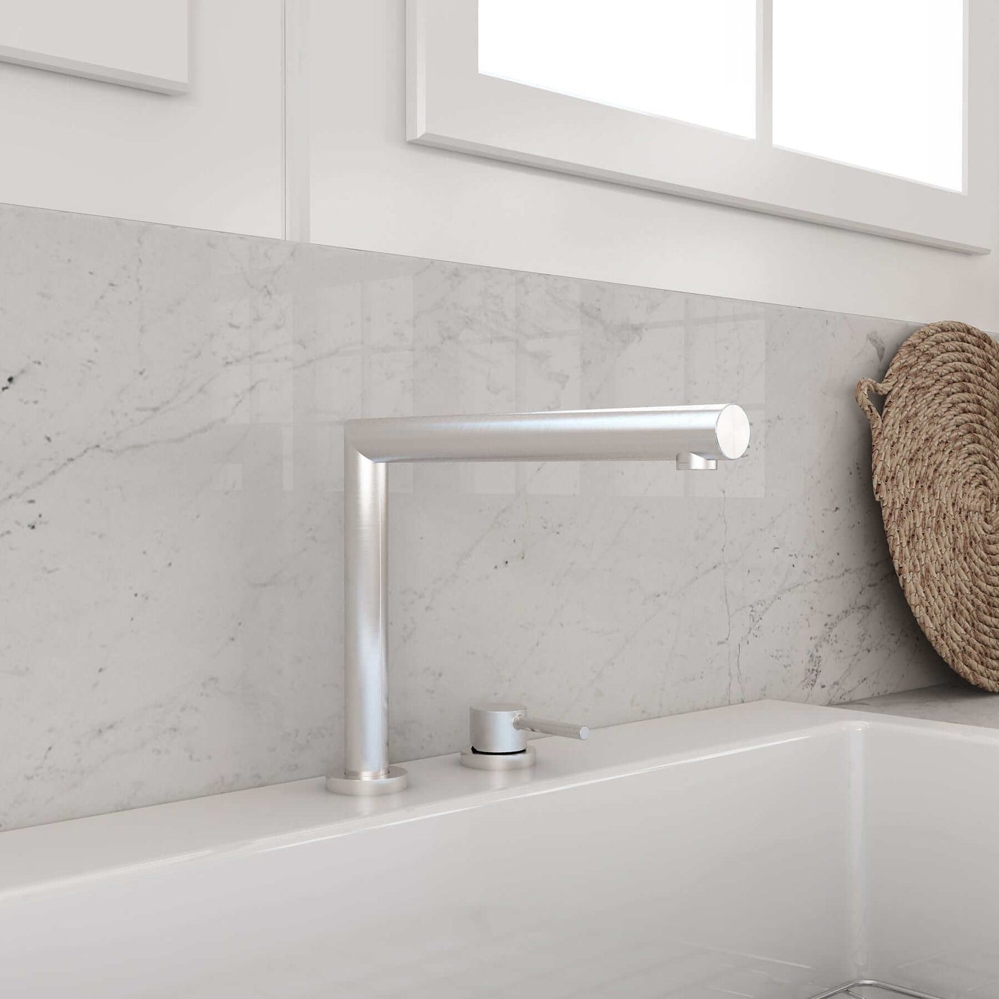 BOCCHI BAVENO Move Kitchen Faucet with sleek design against marble backsplash in modern kitchen.