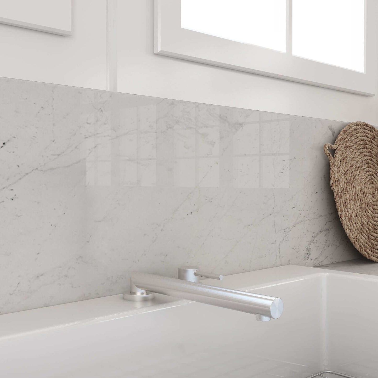 BOCCHI BAVENO Move Kitchen Faucet displayed against a stylish marble backsplash and natural decor.